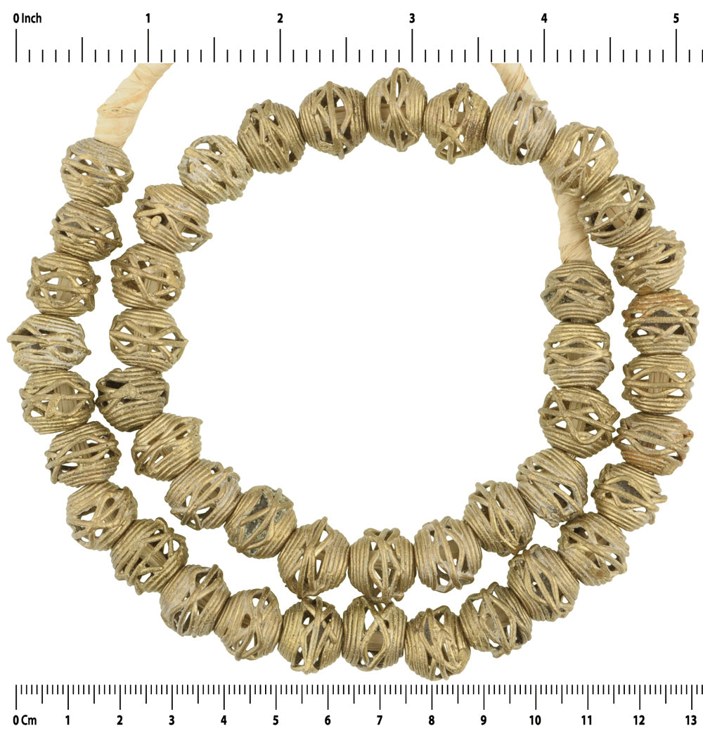 Handcrafted Ashanti Round Brass Beads - Traditional Ghanaian Craft - close-up