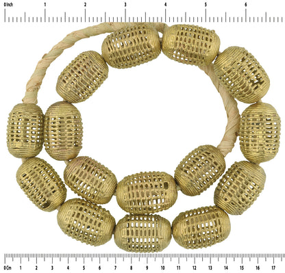 Large Handmade African Brass Beads From Ghana - zoomed-in detail