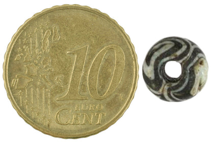 Rare Antique Islamic Folded Glass Bead From Fustat, Egypt - close-up